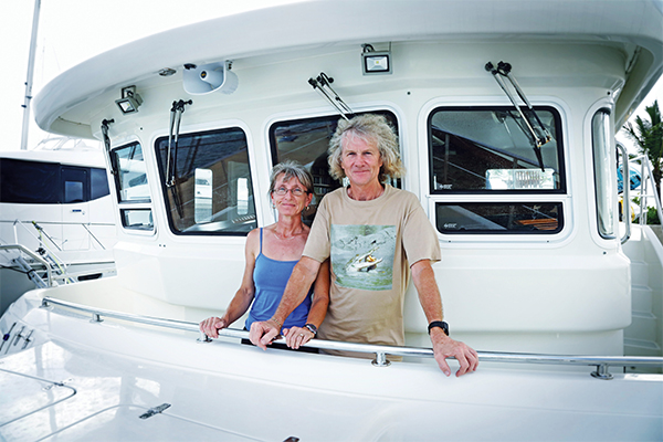 Jennifer and James Hamilton on their boat.